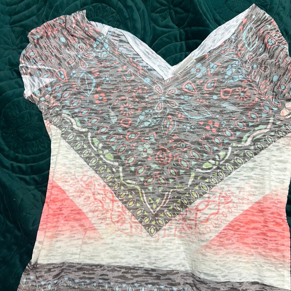 V-neck in front and back, soft cap sleeve top size small